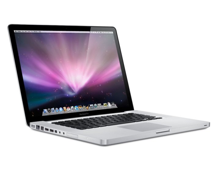 جهاز MacBook Pro مفتوح على خلفية بيضاء.